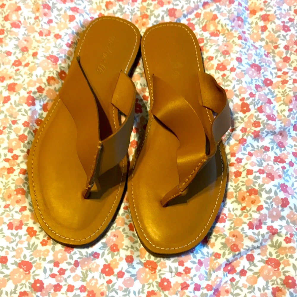 Madewell tan Leather flip flops, size 7.5. Worn for about an hour.